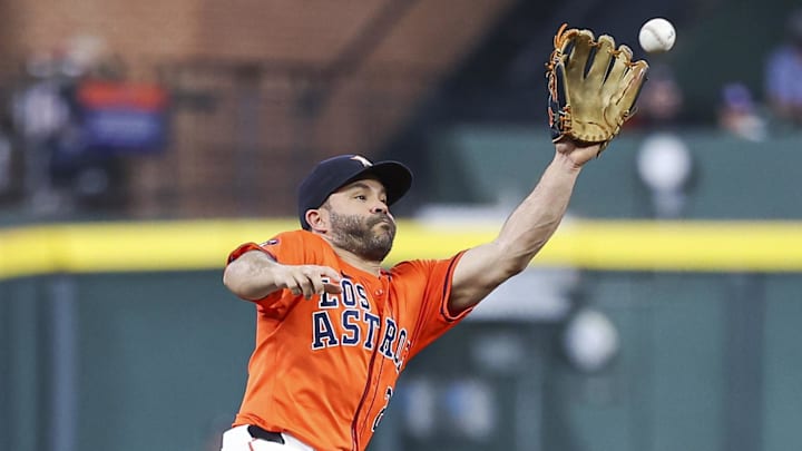 Sep 20, 2024; Houston, Texas, USA; Los Angeles Angels second baseman Jack Lopez (10) attempts to steal second base as Houston Astros second baseman Jose Altuve (27) fields a throw during the third inning at Minute Maid Park