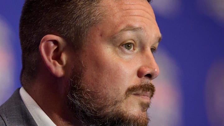 Oregon head coach Dan Lanning listens to a reporter’s question during the head coaches’ press conference ahead of the Peach Bowl at the College Football Hall of Fame in Atlanta, Georgia, on Jan. 8, 2026.