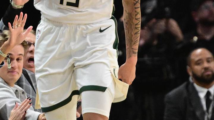 Milwaukee Bucks guard Ryan Rollins (13) reacts after scoring a 3-point basket in the 3rd quarter against the New York Knicks at Fiserv Forum on October 28, 2025.