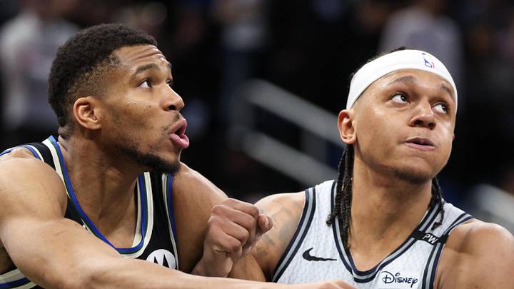 Milwaukee Bucks forward Giannis Antetokounmpo guards Orlando Magic forward Paolo Banchero. Milwaukee Bucks forward Giannis Antetokounmpo guards Orlando Magic forward Paolo Banchero.