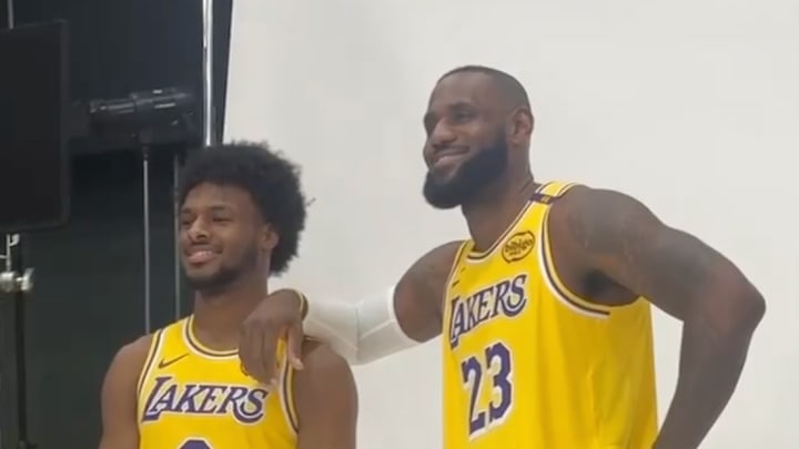 Los Angeles Lakers teammates Bronny James and LeBron James pose during media day.