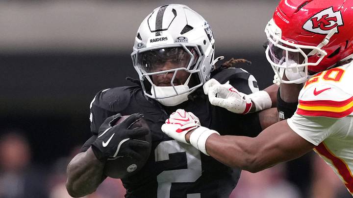 Oct 4, 2026; Paradise, Nevada, USA; Las Vegas Raiders running back Ashton Jeanty (2) runs the ball against Kansas City Chiefs cornerback Nohl Williams (20) during the fourth quarter at Allegiant Stadium. Mandatory Credit: Joe Camporeale-Imagn Images Oct 4, 2026; Paradise, Nevada, USA; Las Vegas Raiders running back Ashton Jeanty (2) runs the ball against Kansas City Chiefs cornerback Nohl Williams (20) during the fourth quarter at Allegiant Stadium. Mandatory Credit: Joe Camporeale-Imagn Images