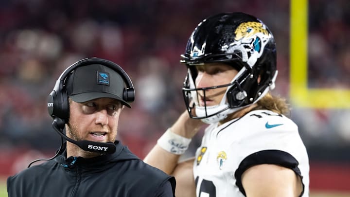 Nov 23, 2025; Glendale, Arizona, USA; Jacksonville Jaguars head coach Liam Coen with quarterback Trevor Lawrence (16) against the Arizona Cardinals at State Farm Stadium. Mandatory Credit: Mark J. Rebilas-Imagn Images