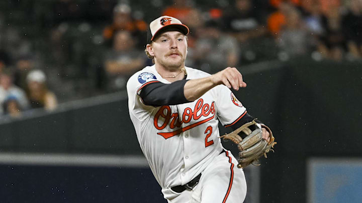 Sep 17, 2024; Baltimore, Maryland, USA; Baltimore Orioles shortstop Gunnar Henderson (2) throws to first base during the eighth inning 
against San Francisco Giants  at Oriole Park at Camden Yards. Mandatory Credit: Tommy Gilligan-Imagn Images