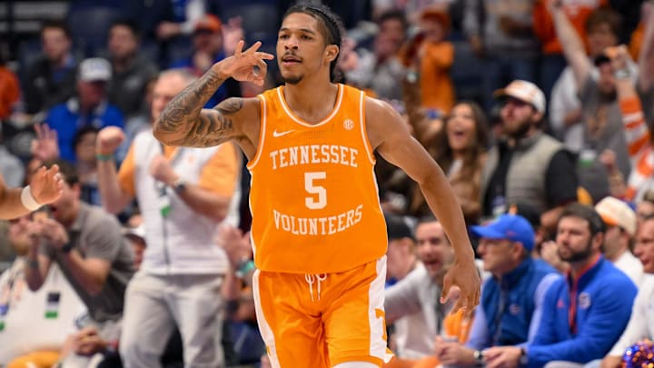 Mar 16, 2025; Nashville, TN, USA;  Tennessee Volunteers guard Zakai Zeigler (5) reacts after a made three point basket  against the Florida Gators during the first half at the 2025 SEC Championship Game at Bridgestone Arena. Mandatory Credit: Steve Roberts-Imagn Images