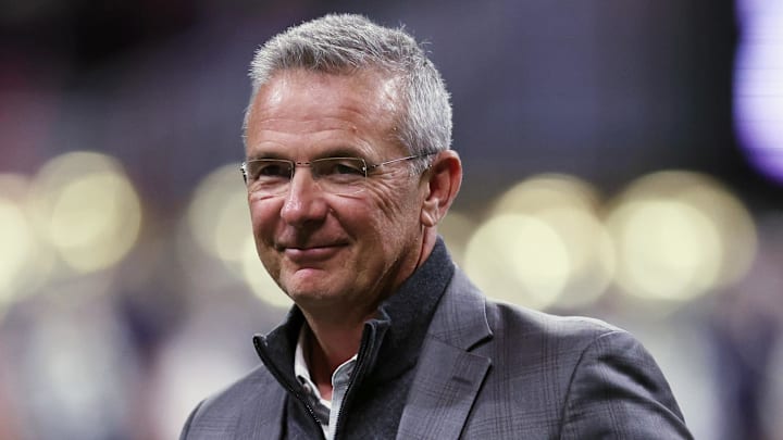 Jan 20, 2025; Atlanta, GA, USA; Urban Meyer looks on during the second half the CFP National Championship college football game at Mercedes-Benz Stadium. Mandatory Credit: Brett Davis-Imagn Images Jan 20, 2025; Atlanta, GA, USA; Urban Meyer looks on during the second half the CFP National Championship college football game at Mercedes-Benz Stadium. Mandatory Credit: Brett Davis-Imagn Images