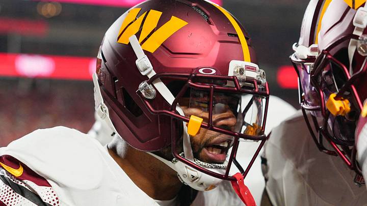 Oct 27, 2025; Kansas City, Missouri, USA; Washington Commanders cornerback Marshon Lattimore (2) celebrates an interception against the Kansas City Chiefs during the first quarter of the game at GEHA Field at Arrowhead Stadium. Mandatory Credit: Jay Biggerstaff-Imagn Images