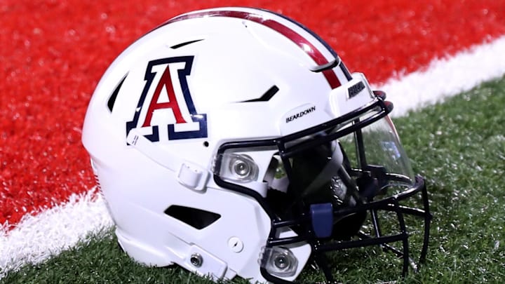 Sep 2, 2023; Tucson, Arizona, USA; Arizona Wildcats quarterback Jayden de Laura (7) helmet on the field after a victory over Northern Arizona Lumberjacks at Arizona Stadium. Mandatory Credit: Zac BonDurant-Imagn Images