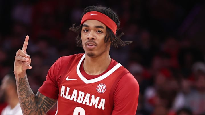 Nov 8, 2025; New York, New York, USA; Alabama Crimson Tide guard Labaron Philon (0) celebrates after making a three point shot in the second half against the St. John's Red Storm at Madison Square Garden. Mandatory Credit: Wendell Cruz-Imagn Images