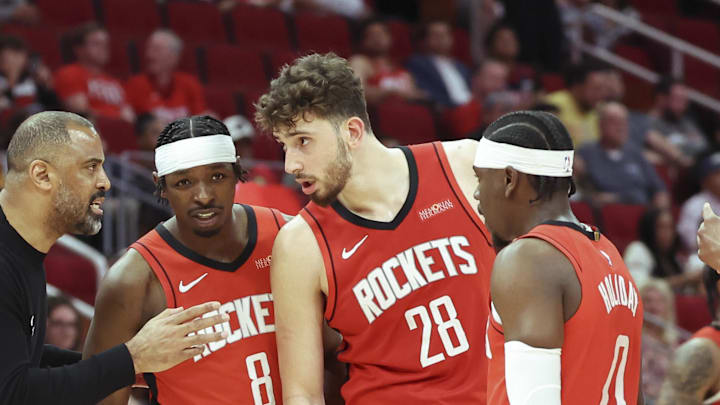 Apr 2, 2025; Houston, Texas, USA; Houston Rockets head coach Ime Udoka talks with players during the fourth quarter against the Utah Jazz at Toyota Center. Mandatory Credit: Troy Taormina-Imagn Images