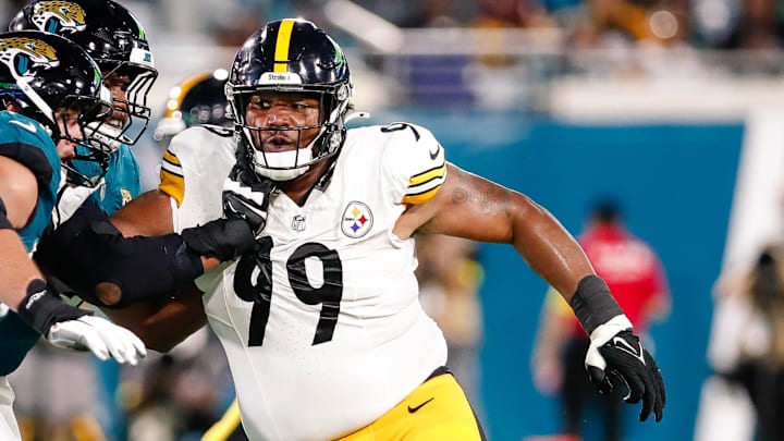 Aug 9, 2025; Jacksonville, Florida, USA; Pittsburgh Steelers defensive tackle Derrick Harmon (99) rushes the passer against the Jacksonville Jaguars during a preseason game at EverBank Stadium. Mandatory Credit: Travis Register-Imagn Images