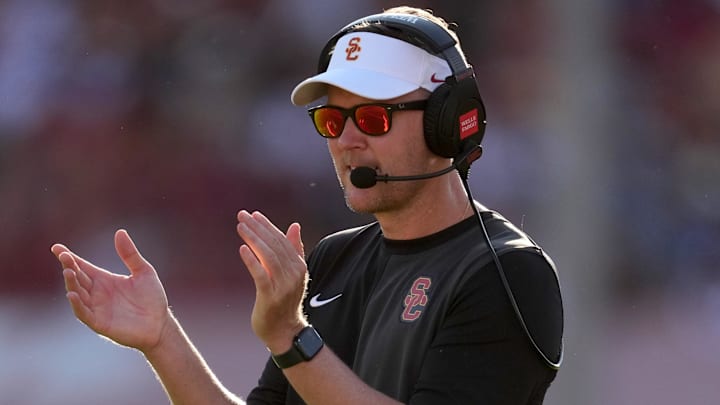 Aug 30, 2025; Los Angeles, California, USA; Southern California Trojans head coach Lincoln Riley watches from the sidelines against the Missouri State Bears in the first half at United Airlines Field at Los Angeles Memorial Coliseum. Mandatory Credit: Kirby Lee-Imagn Images Aug 30, 2025; Los Angeles, California, USA; Southern California Trojans head coach Lincoln Riley watches from the sidelines against the Missouri State Bears in the first half at United Airlines Field at Los Angeles Memorial Coliseum. Mandatory Credit: Kirby Lee-Imagn Images