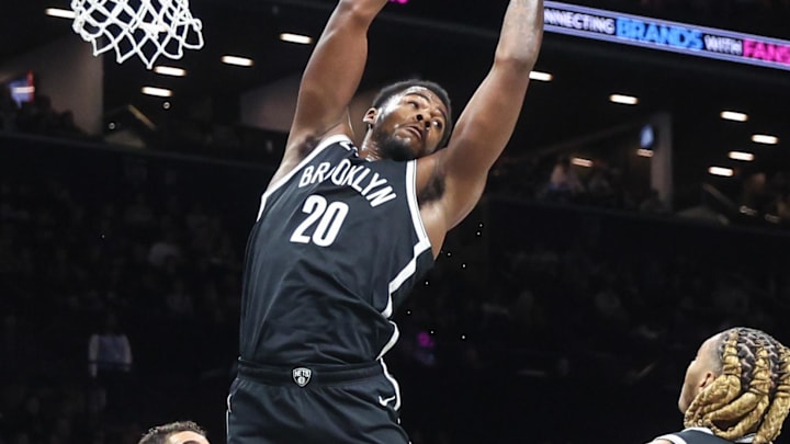 Jan 4, 2026; Brooklyn, New York, USA; Brooklyn Nets center Day'ron Sharpe (20) grabs a rebound in the first quarter against the Denver Nuggets at Barclays Center. Mandatory Credit: Wendell Cruz-Imagn Images Jan 4, 2026; Brooklyn, New York, USA; Brooklyn Nets center Day'ron Sharpe (20) grabs a rebound in the first quarter against the Denver Nuggets at Barclays Center. Mandatory Credit: Wendell Cruz-Imagn Images