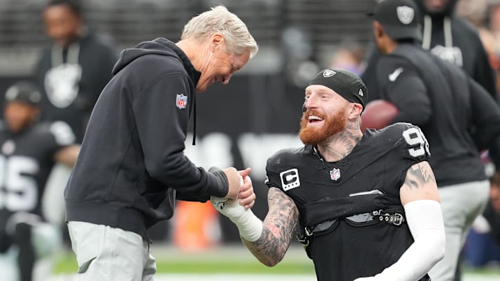 Dec 7, 2025; Paradise, Nevada, USA; Las Vegas Raiders head coach Pete Carroll and defensive end Maxx Crosby (98) interact prior to a game against the Denver Broncos at Allegiant Stadium. Mandatory Credit: Stephen R. Sylvanie-Imagn Images