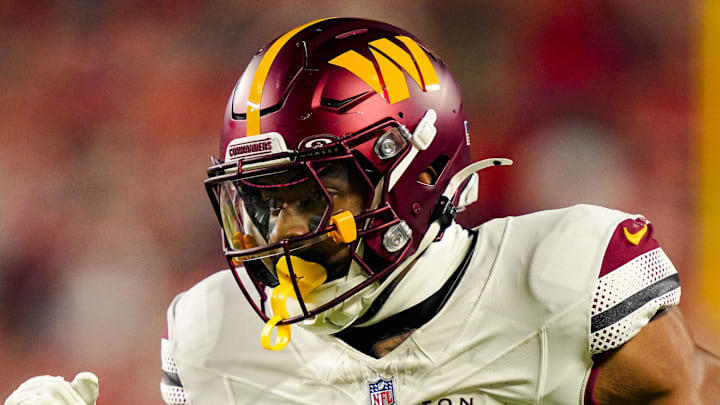 Oct 27, 2025; Kansas City, Missouri, USA; Washington Commanders running back Jeremy McNichols (26) runs the ball during the first half against the Kansas City Chiefs at GEHA Field at Arrowhead Stadium. Mandatory Credit: Jay Biggerstaff-Imagn Images