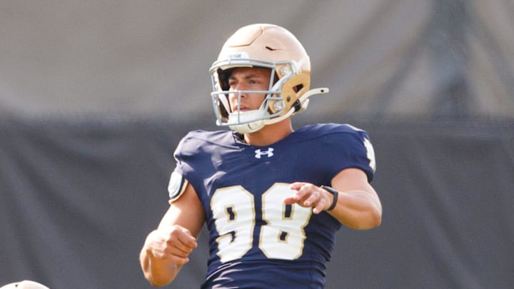 Notre Dame kicker Noah Burnette (98) attempts a field goal out of (10) Tyler Buchner's hold during a football practice at Irish Athletic Center on Saturday, Aug. 2, 2025, in South Bend.
