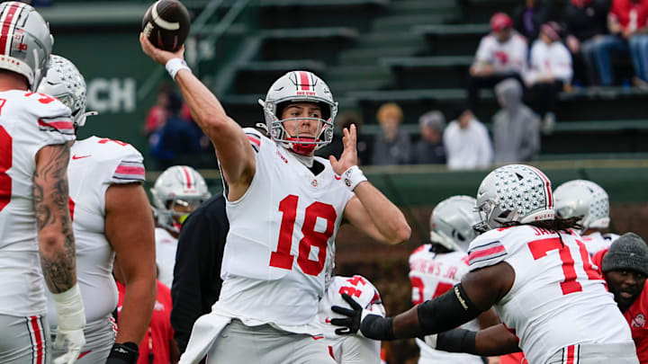 Ohio State Buckeyes quarterback Will Howard (18) warms up prior to the NCAA football game against the Northwestern Wildcats at Wrigley Field in Chicago on Saturday, Nov. 16, 2024.