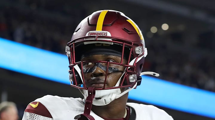 Washington Commanders wide receiver Terry McLaurin reacts after catching the game winning touchdown.
