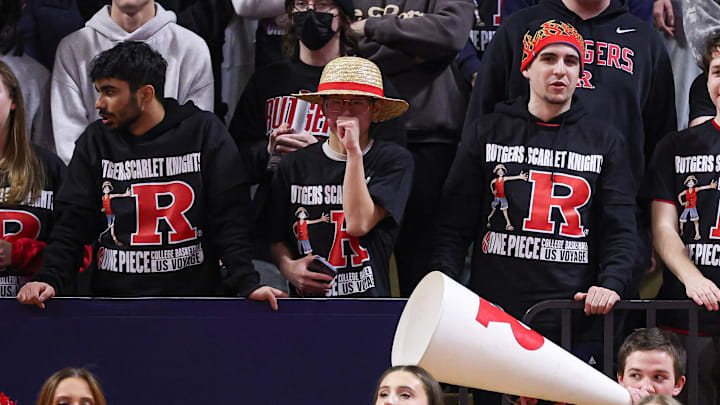 Rutgers fans look on while wearing One Piece T-shirts during the Scarlet Knights' home game last week against Indiana.