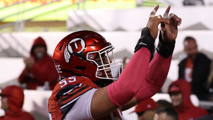 Oct 11, 2025; Salt Lake City, Utah, USA; Utah Utes offensive lineman Spencer Fano (55) celebrates a touchdown against the Arizona State Sun Devils during the third quarter at Rice-Eccles Stadium. Oct 11, 2025; Salt Lake City, Utah, USA; Utah Utes offensive lineman Spencer Fano (55) celebrates a touchdown against the Arizona State Sun Devils during the third quarter at Rice-Eccles Stadium.