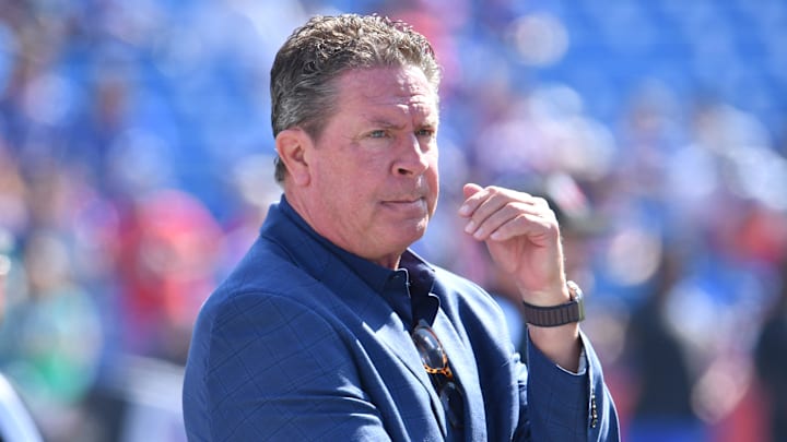 Oct 1, 2023; Orchard Park, New York, USA; Former Miami Dolphins and Hal of Fame quarterback Dan Marino watches warm up drills before a game against the Buffalo Bills at Highmark Stadium. Mandatory Credit: Mark Konezny-Imagn Images