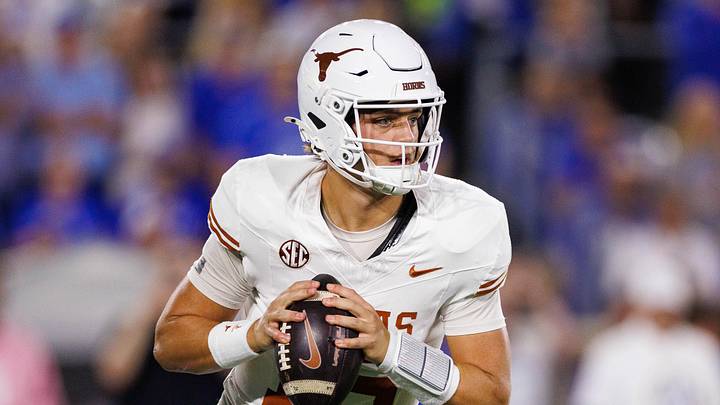 Texas Longhorns quarterback Arch Manning looks for an open receiver during the first quarter against the Kentucky Wildcats at Kroger Field. 