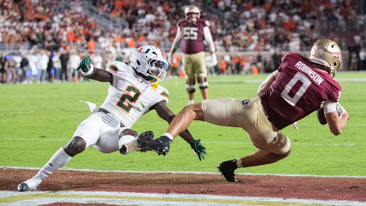 Florida State Seminoles wide receiver Duce Robinson (0) tries to catch the ball in the end zone. The Miami Hurricanes defeated the Florida State Seminoles 22-28 at Doak Campbell Stadium on Saturday, Oct. 4, 2025.