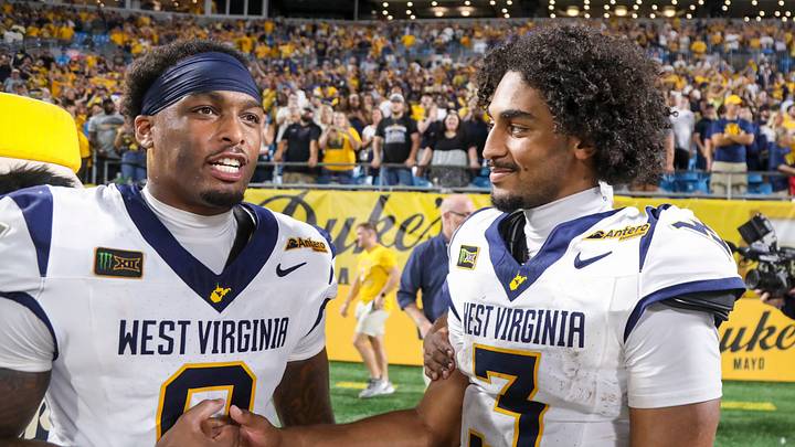 Sep 19, 2026; Charlotte, North Carolina, USA; West Virginia Mountaineers tight end Josh Sapp (0) celebrates with West Virginia Mountaineers quarterback Michael Hawkins Jr. (3) after defeating the Virginia Cavaliers at Bank of America Stadium. Mandatory Credit: Ben Queen-Imagn Images Sep 19, 2026; Charlotte, North Carolina, USA; West Virginia Mountaineers tight end Josh Sapp (0) celebrates with West Virginia Mountaineers quarterback Michael Hawkins Jr. (3) after defeating the Virginia Cavaliers at Bank of America Stadium. Mandatory Credit: Ben Queen-Imagn Images