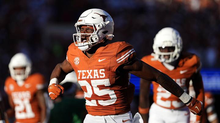 Texas Longhorns defensive back Jelani McDonald reacts after making an interception during the first half against the Kentucky Wildcats Texas Longhorns defensive back Jelani McDonald reacts after making an interception during the first half against the Kentucky Wildcats