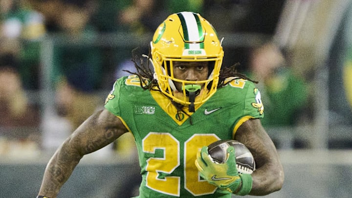 Nov 9, 2024; Eugene, Oregon, USA; Oregon Ducks running back Jordan James (20) carries the ball during the first half against the Maryland Terrapins at Autzen Stadium. Mandatory Credit: Troy Wayrynen-Imagn Images