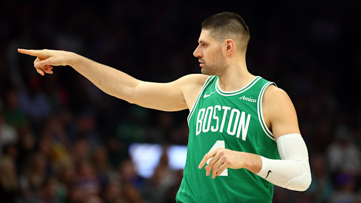 Feb 24, 2026; Phoenix, Arizona, USA; Boston Celtics center Nikola Vucevic (4) reacts against the Phoenix Suns in the first half at Mortgage Matchup Center. Mandatory Credit: Mark J. Rebilas-Imagn Images