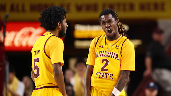 Feb 28, 2026; Tempe, Arizona, USA; Arizona State Sun Devils guard Anthony Johnson (2) celebrates with guard Maurice Odum (5) against the Utah Utes in the second half at Desert Financial Arena. Mandatory Credit: Mark J. Rebilas-Imagn Images