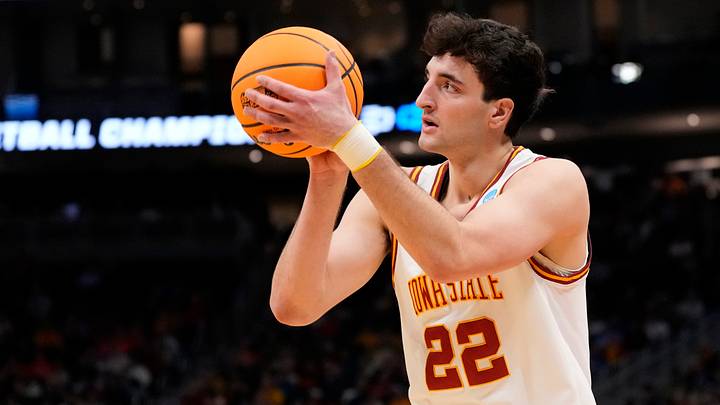 Mar 23, 2025; Milwaukee, WI, USA;  Iowa State Cyclones forward Milan Momcilovic (22) shoots against the Mississippi Rebels during the second half in the second round of the NCAA Tournament at Fiserv Forum. Mandatory Credit: Jeff Hanisch-Imagn Images