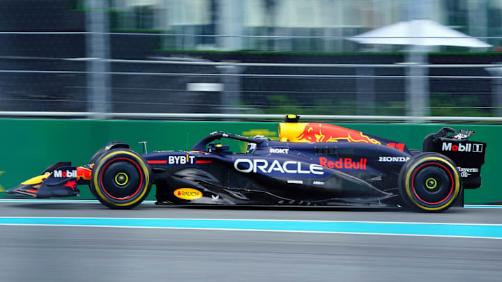 May 3, 2024; Miami Gardens, Florida, USA; Red Bull Racing driver Sergio Perez (11) enters the track during F1 practice at Miami International Autodrome. Mandatory Credit: John David Mercer-Imagn Images 