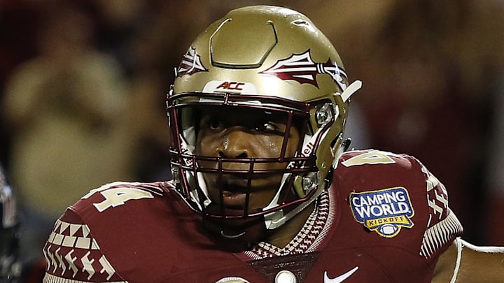 Sep 5, 2016; Orlando, FL, USA;  Florida State Seminoles defensive end DeMarcus Walker (44) during the second half at Camping World Stadium. Florida State Seminoles defeated the Mississippi Rebels 45-34. Mandatory Credit: Kim Klement-Imagn Images