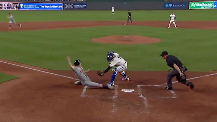 Jung slides into home plate against the Kansas City Royals Jung slides into home plate against the Kansas City Royals