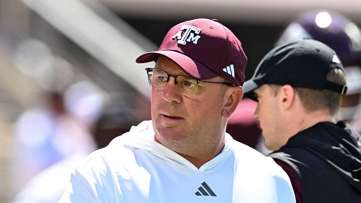 Texas A&M Aggies head coach Mike Elko walks on the field prior to the game against the Auburn Tigers at Kyle Field. Texas A&M Aggies head coach Mike Elko walks on the field prior to the game against the Auburn Tigers at Kyle Field.