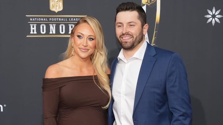 Feb 8, 2024; Las Vegas, NV, USA; Baker Mayfield and Emily Wilkinson on the red carpet before the NFL Honors show at Resorts World Theatre. Mandatory Credit: Kirby Lee-Imagn Images