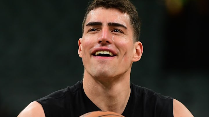 Apr 19, 2026; Boston, Massachusetts, USA; Boston Celtics center Luka Garza (52) shoots the ball during warmups prior to game one of the first round of the 2026 NBA Playoffs against the Philadelphia 76ers at TD Garden. Mandatory Credit: Bob DeChiara-Imagn Images