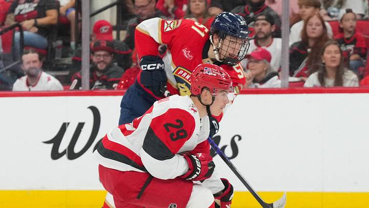 Sep 24, 2025; Raleigh, North Carolina, USA; Florida Panthers defenseman Marek Alscher (51) gets the shot past Carolina Hurricanes left wing Bradly Nadeau (29) during the second period at Lenovo Center. Mandatory Credit: James Guillory-Imagn Images Sep 24, 2025; Raleigh, North Carolina, USA; Florida Panthers defenseman Marek Alscher (51) gets the shot past Carolina Hurricanes left wing Bradly Nadeau (29) during the second period at Lenovo Center. Mandatory Credit: James Guillory-Imagn Images