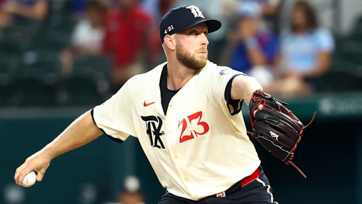 Aug 8, 2025; Arlington, Texas, USA;  Texas Rangers starting pitcher Merrill Kelly (23) throws during the first inning against the Philadelphia Phillies at Globe Life Field. Mandatory Credit: Kevin Jairaj-Imagn Images