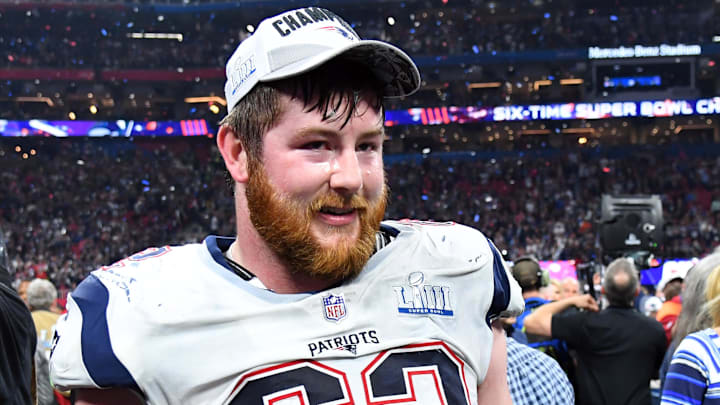 Former New England Patriots offensive guard Joe Thuney (62) celebrates after winning Super Bowl LIII against the Los Angeles Rams at Mercedes-Benz Stadium.