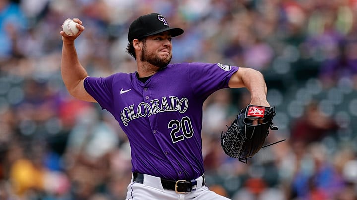 Aug 8, 2024; Denver, Colorado, USA; Colorado Rockies relief pitcher Peter Lambert (20) pitches in the fifth inning against the New York Mets at Coors Field.
