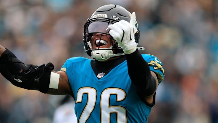 Jacksonville Jaguars safety Antonio Johnson (26) reacts to his tackle during the first quarter of an NFL football matchup at EverBank Stadium, Sunday, Jan. 4, 2026, in Jacksonville, Fla. The Jaguars defeated the Titans 41-7, capturing the AFC South title.