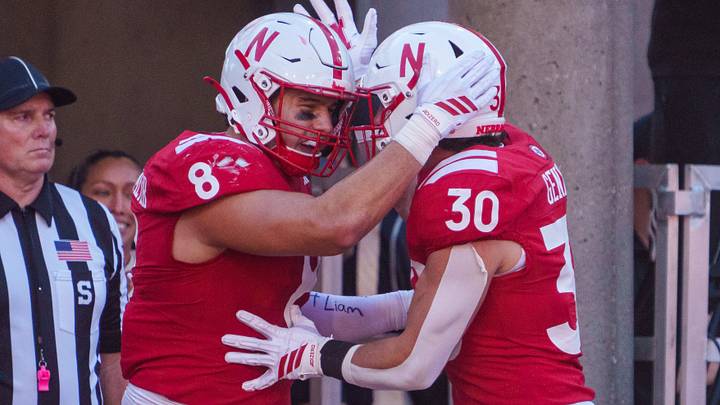 Nebraska tight end Luke Lindenmeyer (8) and running back Vincent Genatone celebrate after a touchdown against Maryland during the second quarter at Memorial Stadium. Nebraska tight end Luke Lindenmeyer (8) and running back Vincent Genatone celebrate after a touchdown against Maryland during the second quarter at Memorial Stadium.