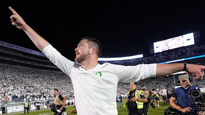 Sep 27, 2025; University Park, Pennsylvania, USA; Oregon Ducks head coach Dan Lanning reacts after defeating the Penn State Nittany Lions at Beaver Stadium. Mandatory Credit: James Lang-Imagn Images