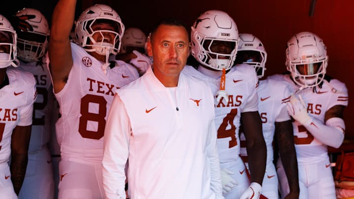 Texas Longhorns head coach Steve Sarkisian leads the team out of the tunnel before a game against the Florida Gators at Ben Hill Griffin Stadium. 
