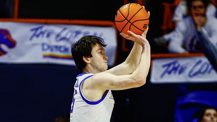 Feb 20, 2024; Boise, Idaho, USA;  Boise State Broncos guard RJ Keene (5) shoots a three-point shot during the first half against the San Jose State Spartans at ExtraMile Arena. Mandatory Credit: Brian Losness-Imagn Images

