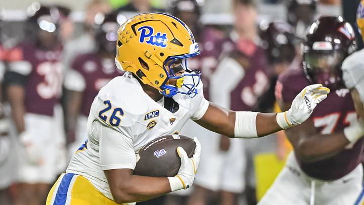Oct 2, 2026; Blacksburg, Virginia, USA;  Pittsburgh Panthers running back Damon Ferguson Jr. (26) runs the ball during the second quarter against the Virginia Tech Hokies at Lane Stadium.  Mandatory Credit: Brian Bishop-Imagn Images