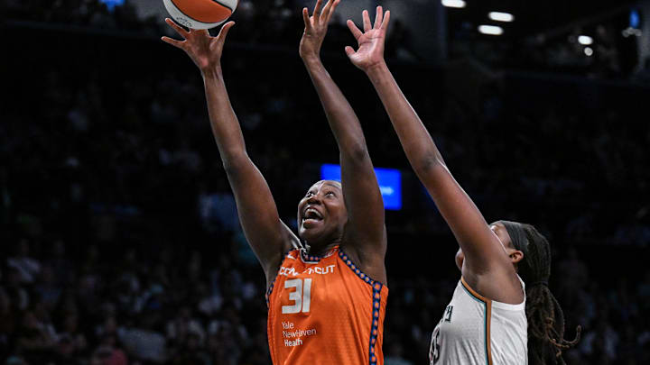Aug 25, 2025; Brooklyn, New York, USA; Connecticut Sun center Tina Charles (31) shoots the ball while defended by New York Liberty center Jonquel Jones (35) during the second half at Barclays Center. Mandatory Credit: John Jones-Imagn Images Aug 25, 2025; Brooklyn, New York, USA; Connecticut Sun center Tina Charles (31) shoots the ball while defended by New York Liberty center Jonquel Jones (35) during the second half at Barclays Center. Mandatory Credit: John Jones-Imagn Images